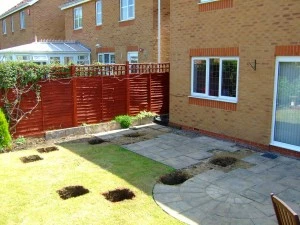 digging out holes for the Durabase pads