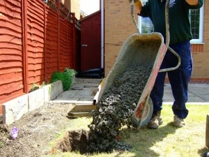 filling the holes with concrete for the Durabase